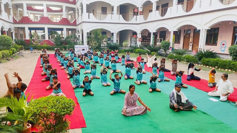 Banda : Children learning nuances of yoga at Bhagwat Prasad Memorial Academy 