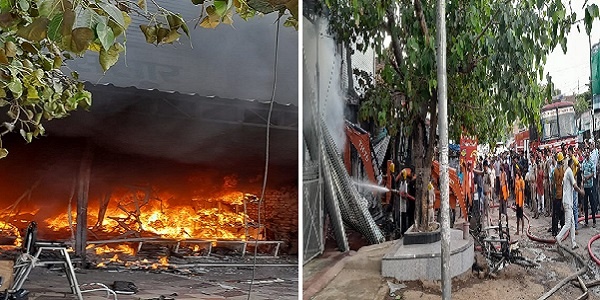 Banda : कपड़े की दुकान में आग से लाखों का सामान जलकर राख