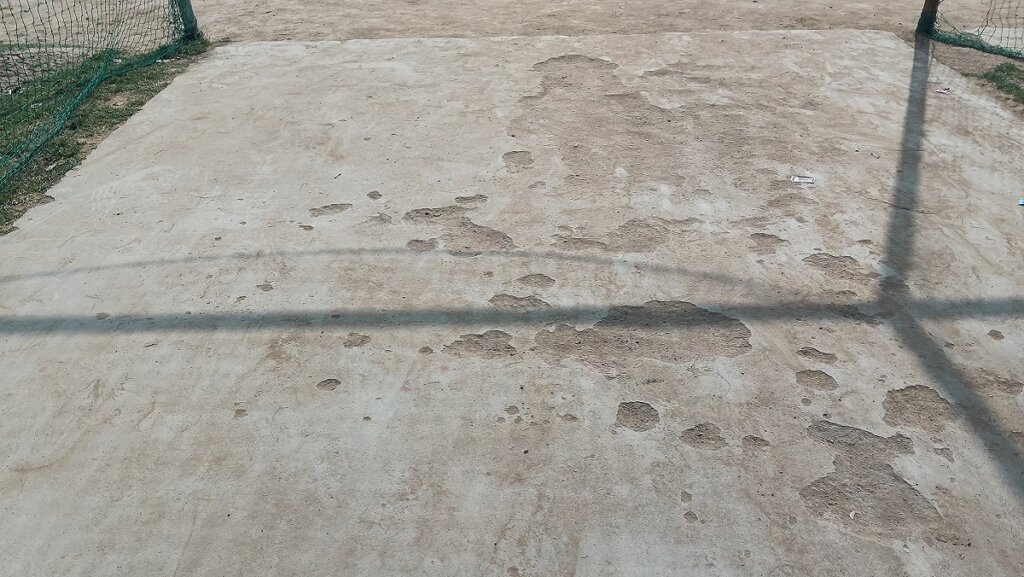 Cricket players forced to practice on broken pitch at Banda Sports Stadium