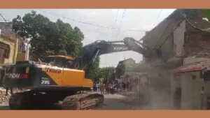 Encroachment is being removed Jail Road using Bulldozer-Pokland in Banda