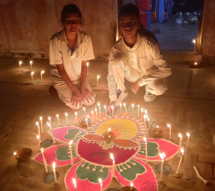 Happy_Diwlai: Cricket trainees celebrated Diwali by decorating rangoli and lighting diyas at Banda Stadium