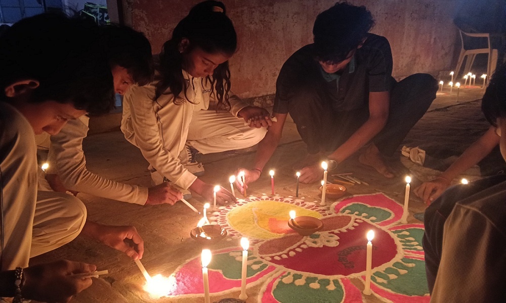 Happy_Diwlai: Cricket trainees celebrated Diwali by decorating rangoli and lighting diyas at Banda Stadium