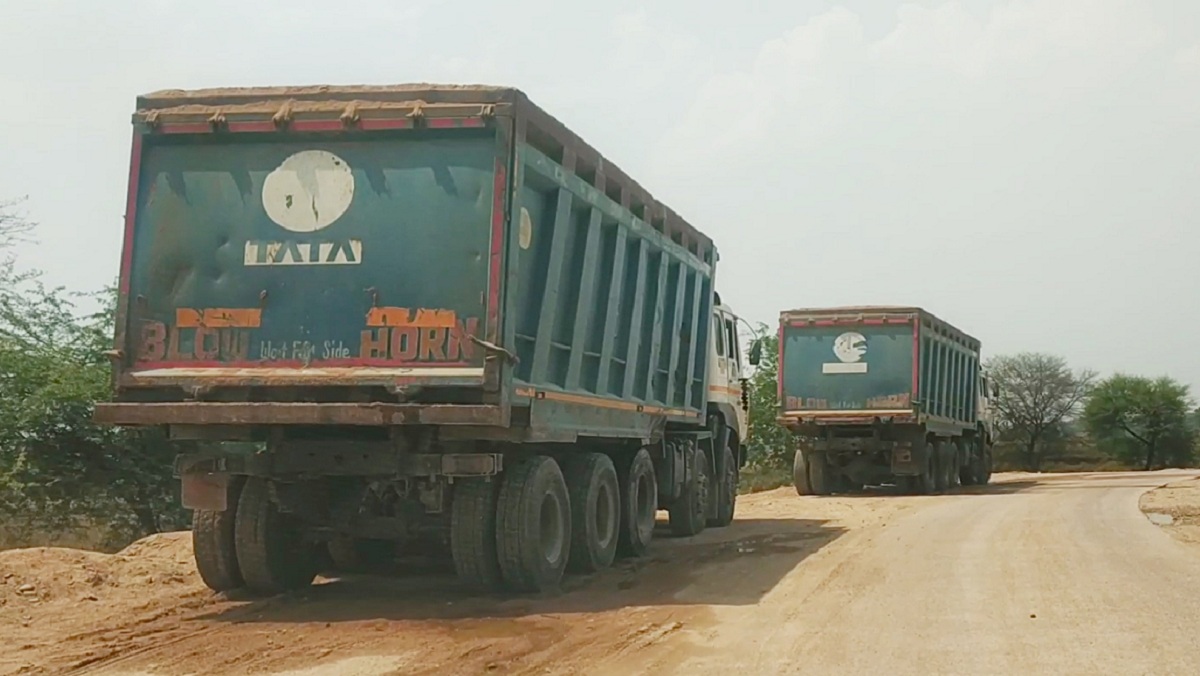 overloaded mining trucks running without number plates from MP to UP