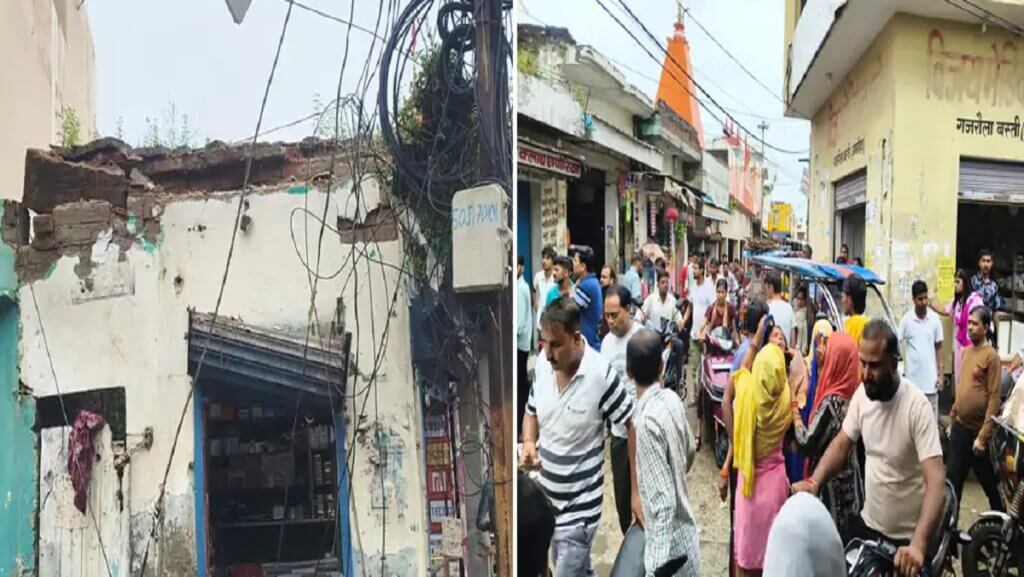 गजरौला में टूटे छज्जे वाली दुकान और लोगों की भीड़।
